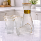 6glasses with a jar